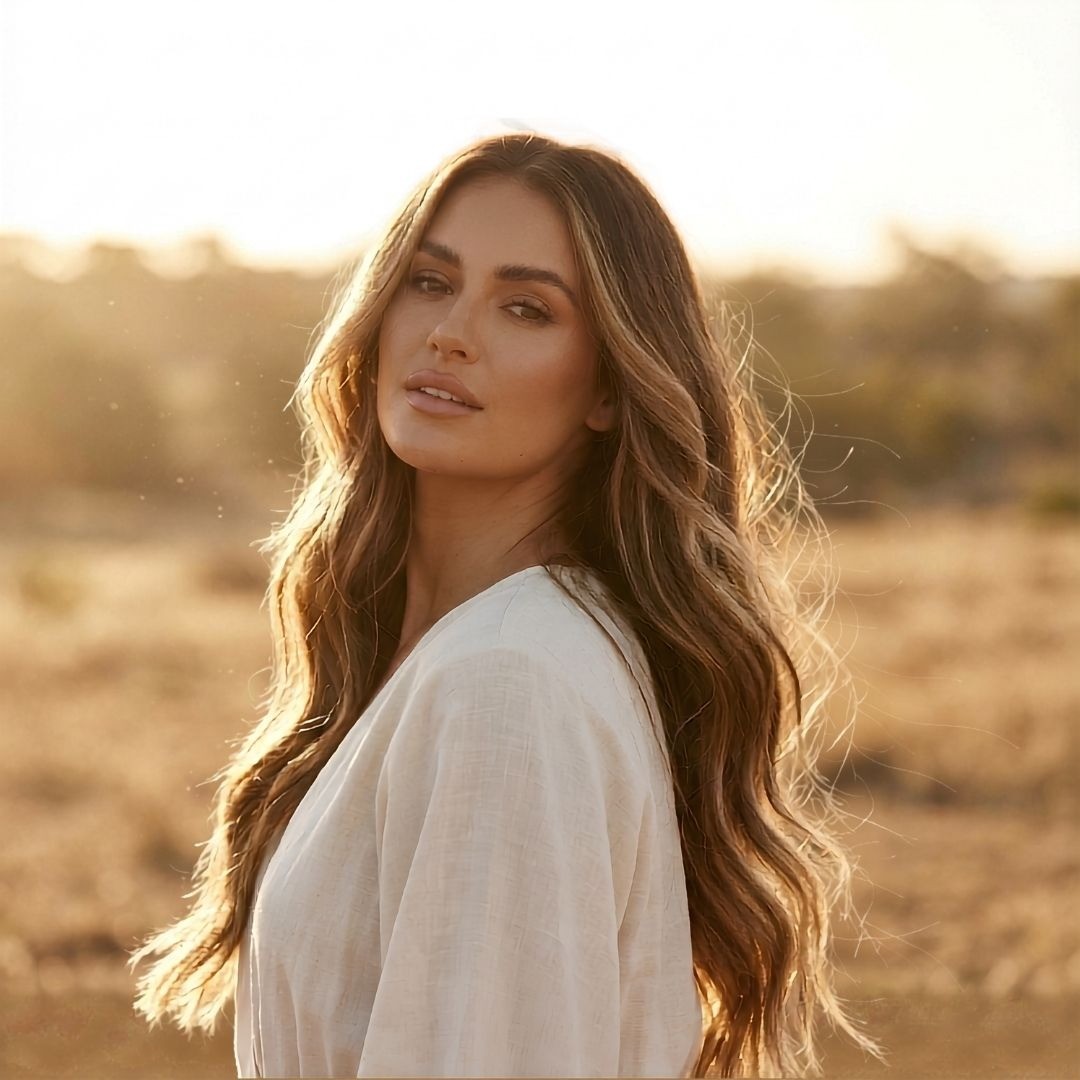 Woman wearing DULGE Clip-In Hair Extensions